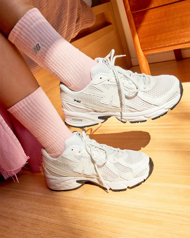 The NB 740 - just dropped 👟
 
From 7:40am to 7:40pm - one shoe, the perfect blend of all day style & performance. Shop online and in-store now. 

ID: An image of a person's lower legs wearing a pair of white New Balance 740 trainers with pink socks whilst sitting on the edge of a wooden bed.