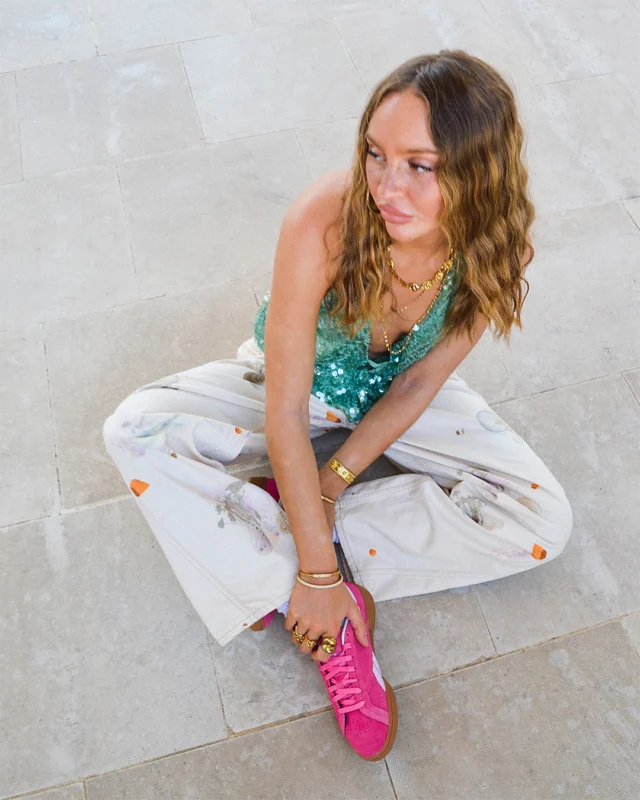 Sun’s out, sales on. Oh, and did we mention there's up to 70% off? 🔥

Shop the Reebok Club C Grounds in pink for less, now online and in-store.

ID: An image of a person wearing a pair of pink Reeboc Club C Grounds trainers with white jeans and sparkly teal top whilst sitting on a white stone floor.