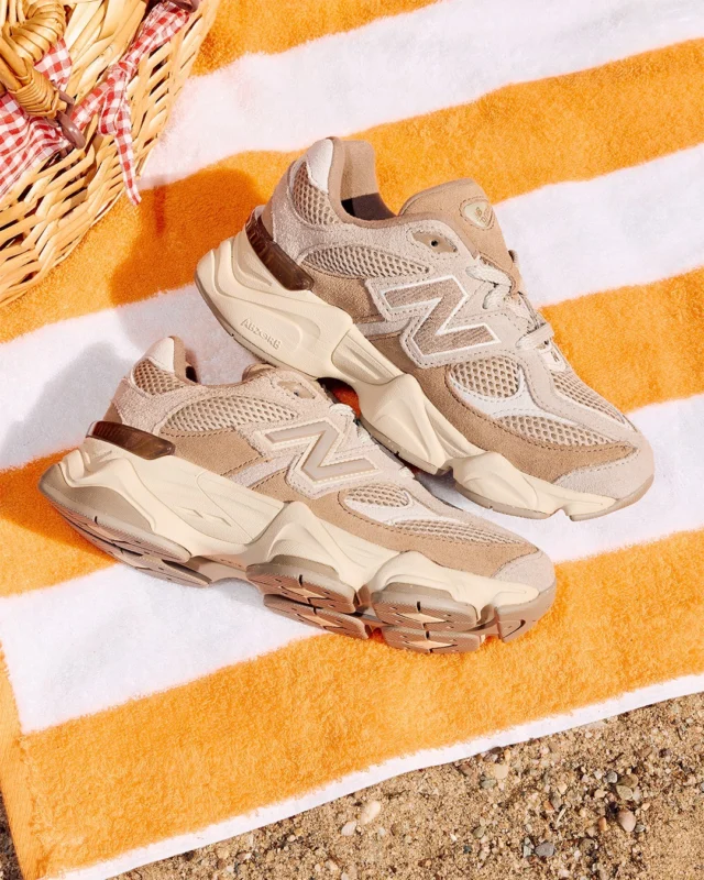 Mood: out of office ☀️

Shop New Balance 9060 in brown, online and in-store now.

ID: An image of a pair of brown New Balance 9060 trainers laying sideways on an orange and white stripy towel on a sandy ground.